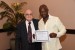 Dr. Nagib Callaos, General Chair, giving Professor Masengo Ilunga the best paper award certificate of the session "Qualitative Research, Modeling, and Methodologies ." The title of the awarded paper is "Analytic Hierarchy Process (AHP) in Ranking Streamflow Gauges for Runoff Estimation in an Urbanized Catchment."